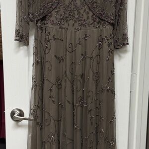 Camille La Vie Green Embellished Gown with 3/4 Sleeves